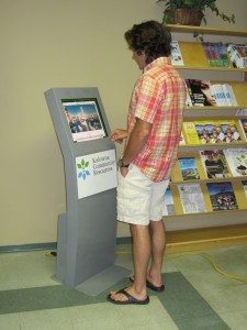 Andrew using the kiosk